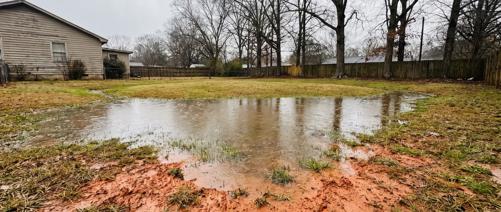 Yard Drainage in Durham, NC — One Office, a Low Threshold, and Clay That Won't Take Water